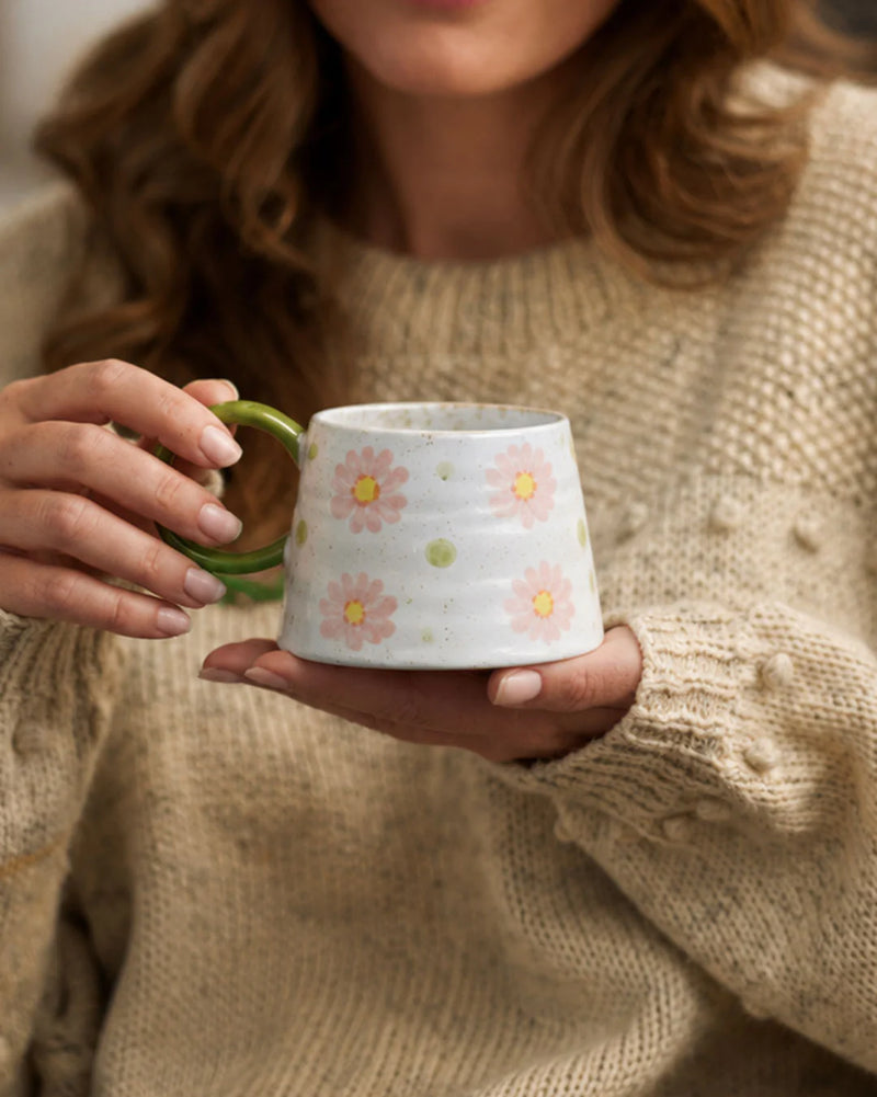 Large handled stoneware coffee mug featuring colourful floral artwork and hand-brushed glaze finish.