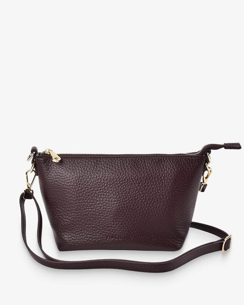 Elms+King Leyton Xbody bag in Wine with light gold-plated hardware.