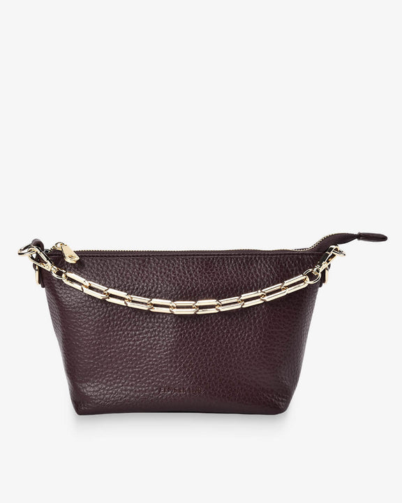 Women's structured Wine crossbody bag with decorative chain strap.