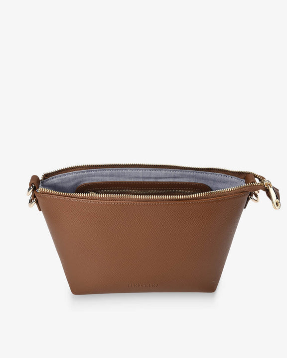 Leyton crossbody bag - Brown leather pouch with gold zipper on a white background