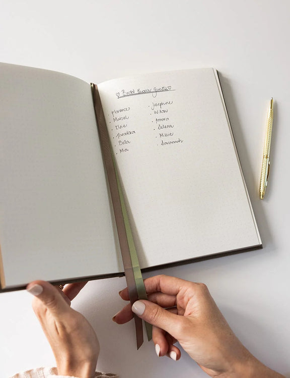 fern green linen journal with bullet pages and satin ribbon markers.