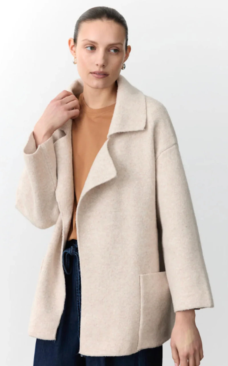 Little Lies Mahalia coatigan in oat tone designed for winter layering with front pockets and open styling.