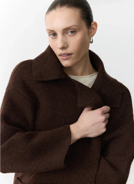 Women's chocolate brown knit coatigan featuring open front styling and large front pockets.
