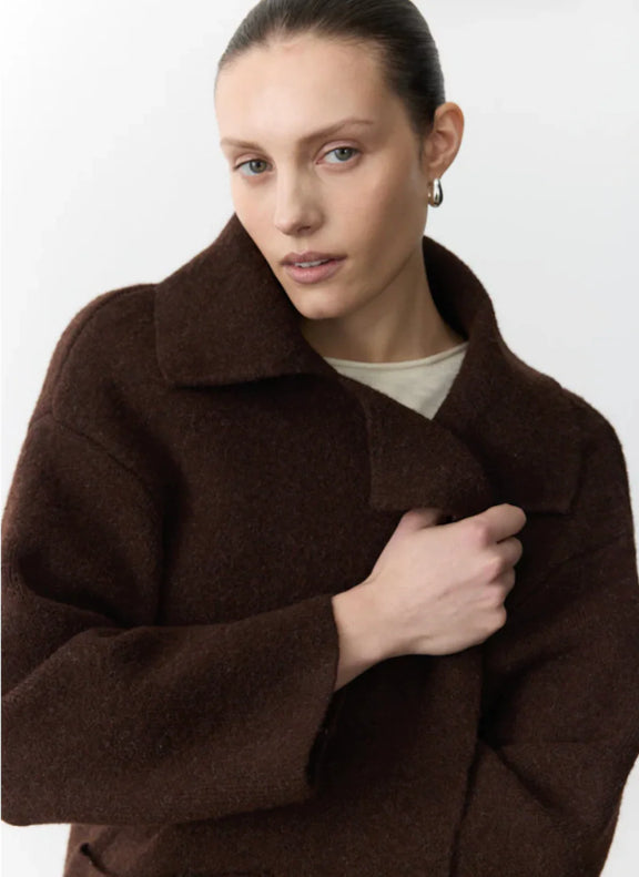 Women's chocolate brown knit coatigan featuring open front styling and large front pockets.