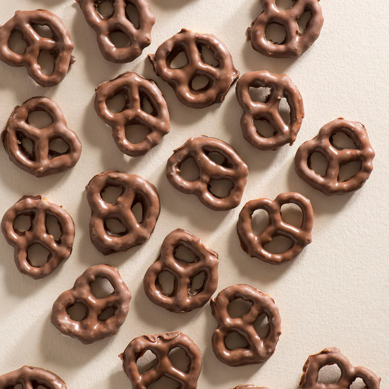 Milk chocolate coated pretzels by New Farm Confectionery gourmet snack