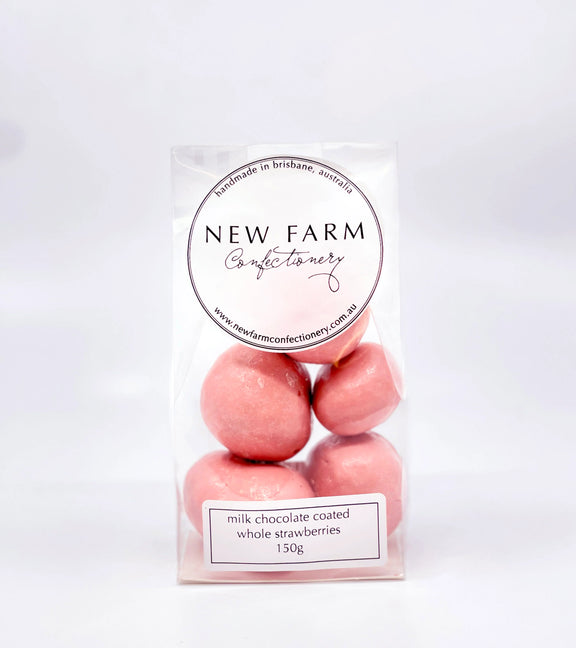 Packaged pink chocolate-coated strawberries with 'New Farm Confectionery' label on a white background - New Farm Confectionery chocolate coated strawberries