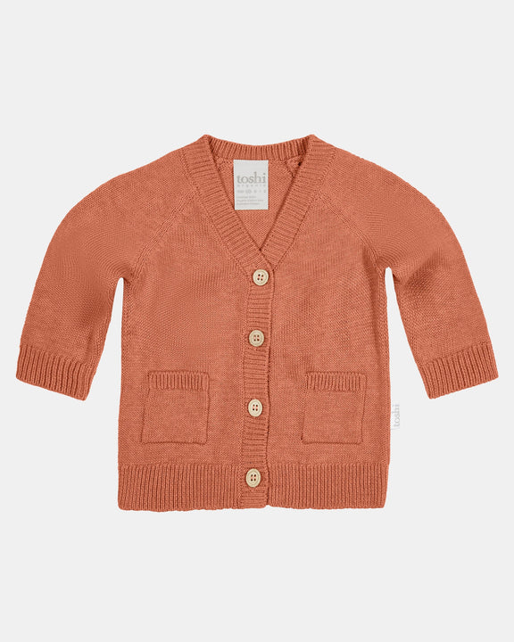 Orange cardigan with button details on a light gray background - Toshi Organic Cardigan Remy Tumbleweed