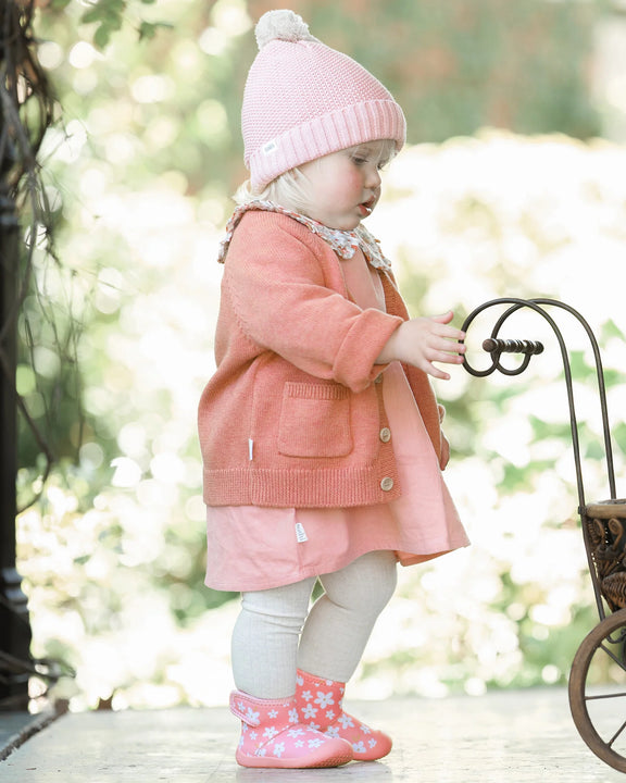 Child in pink coat and hat standing outdoors with a blurred background - Toshi Organic Cardigan Remy Tumbleweed