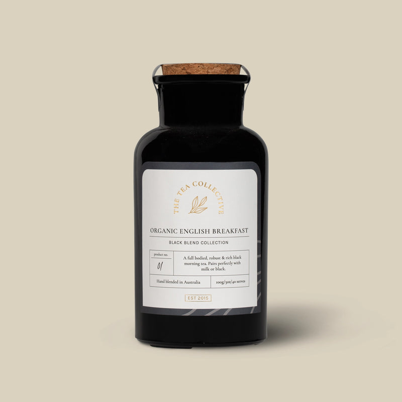 Organic English Breakfast loose leaf black tea by The Tea Collective in an apothecary-style glass jar.