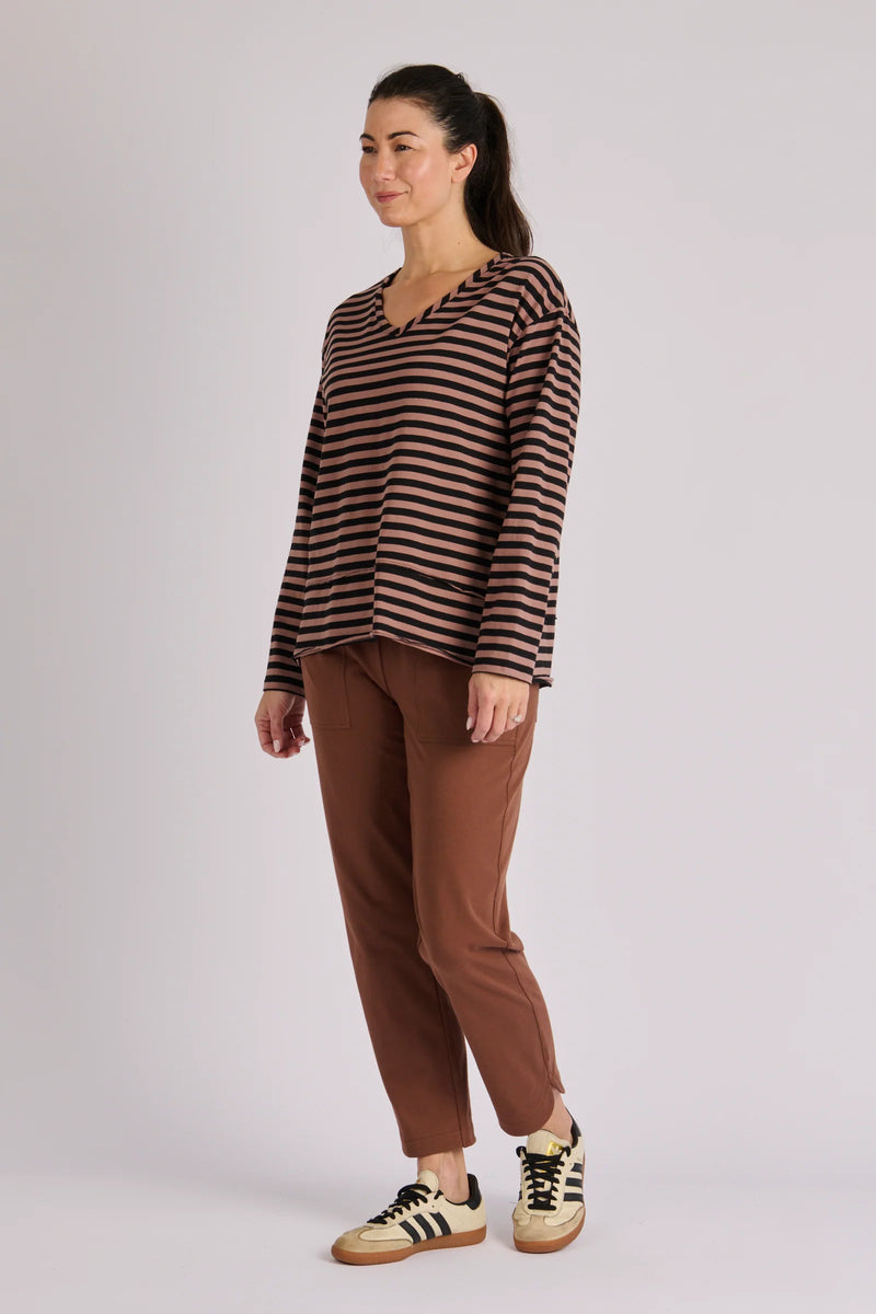 Long sleeve striped women's top in brown tones with swing shape and comfortable stretch fabric.