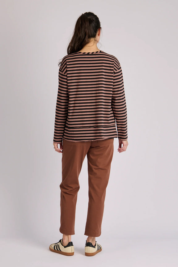 Women's brown striped cotton elastane top featuring long sleeves and a flared hemline for movement.