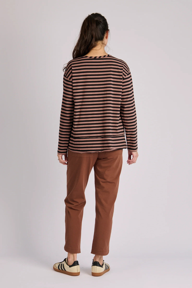 Women's brown striped cotton elastane top featuring long sleeves and a flared hemline for movement.