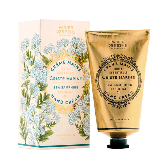 Hand cream with packaging featuring floral design and branding on a white background