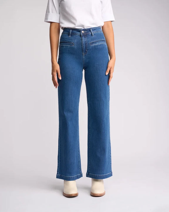 Vassalli Peace Jeans in blue wash with contrast tan stitching.