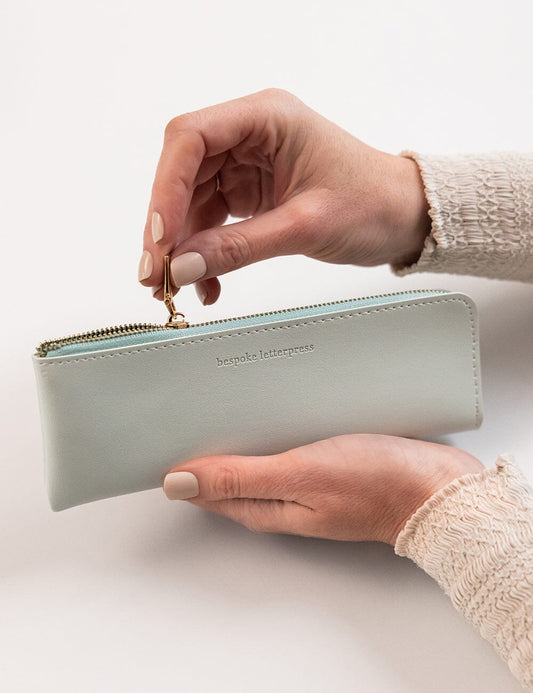 Light blue vegan leather pencil case for pens, pencils and stationery.