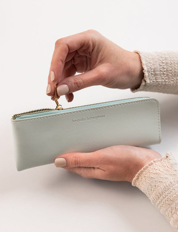 Light blue vegan leather pencil case for pens, pencils and stationery.