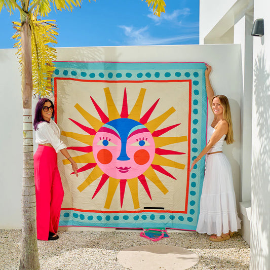 Colourful picnic mat with shoulder strap and storage pocket