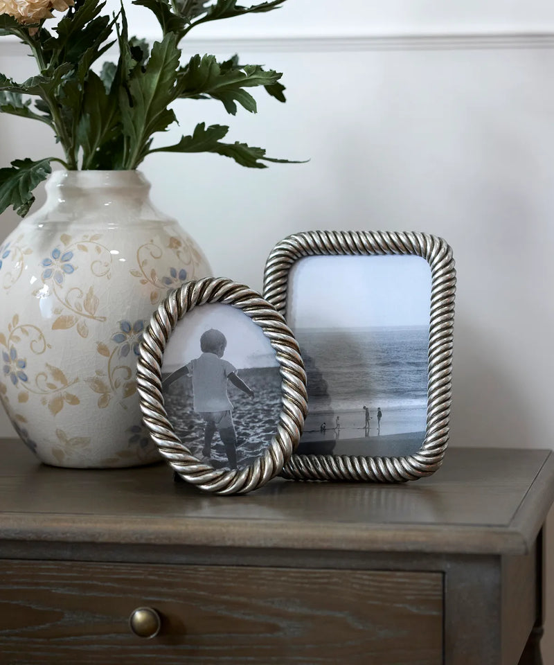 Silver rope style oval photo frame- styled on side table
