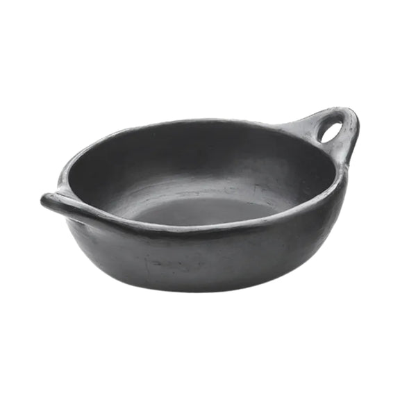 Black La Chamba round serving dish handcrafted from Colombian clay for cooking and serving meals.