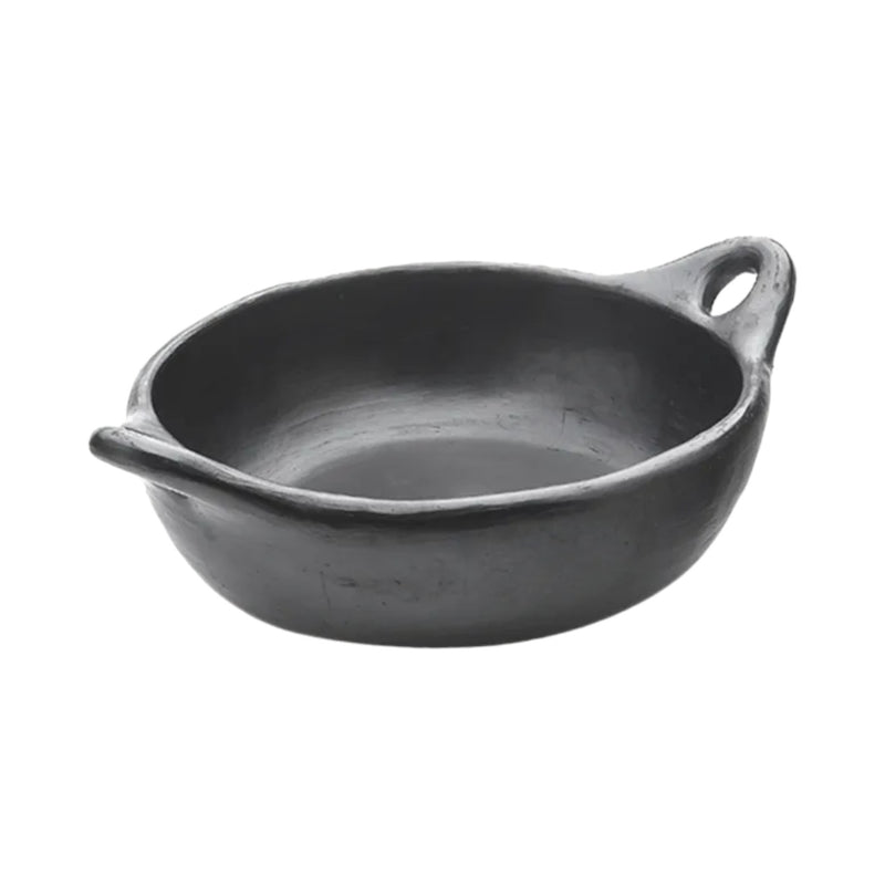 Black La Chamba round serving dish handcrafted from Colombian clay for cooking and serving meals.