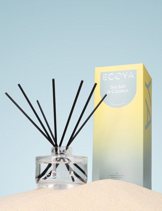 Premium 200ml Ecoya Sea Salt and Coconut diffuser with rounded glass base and black reeds.