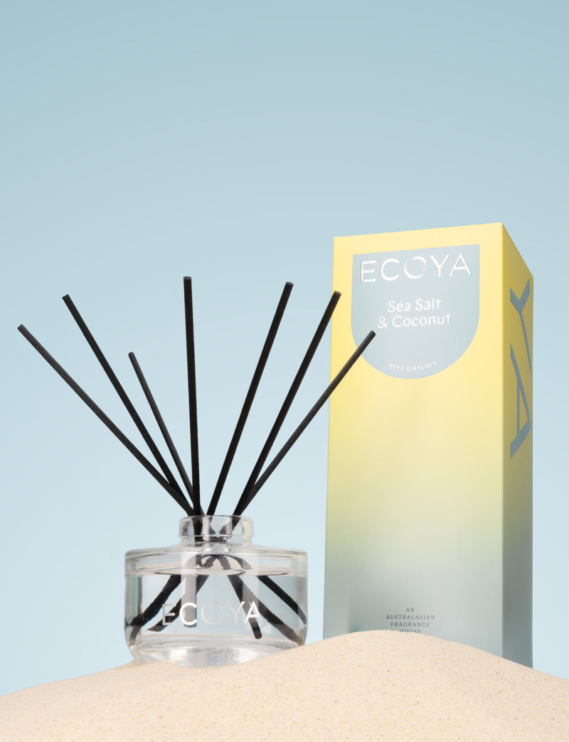 Premium 200ml Ecoya Sea Salt and Coconut diffuser with rounded glass base and black reeds.