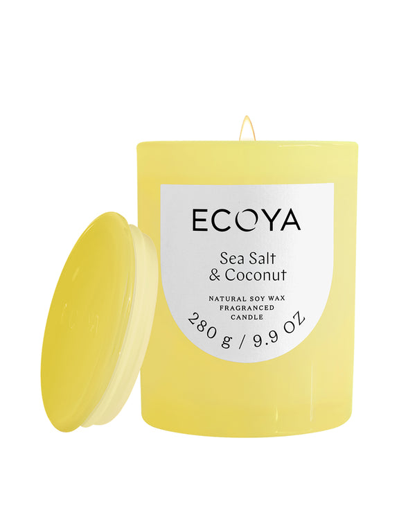Ecoya Sea Salt and Coconut Metro Candle in a translucent coloured glass vessel with glass lid.