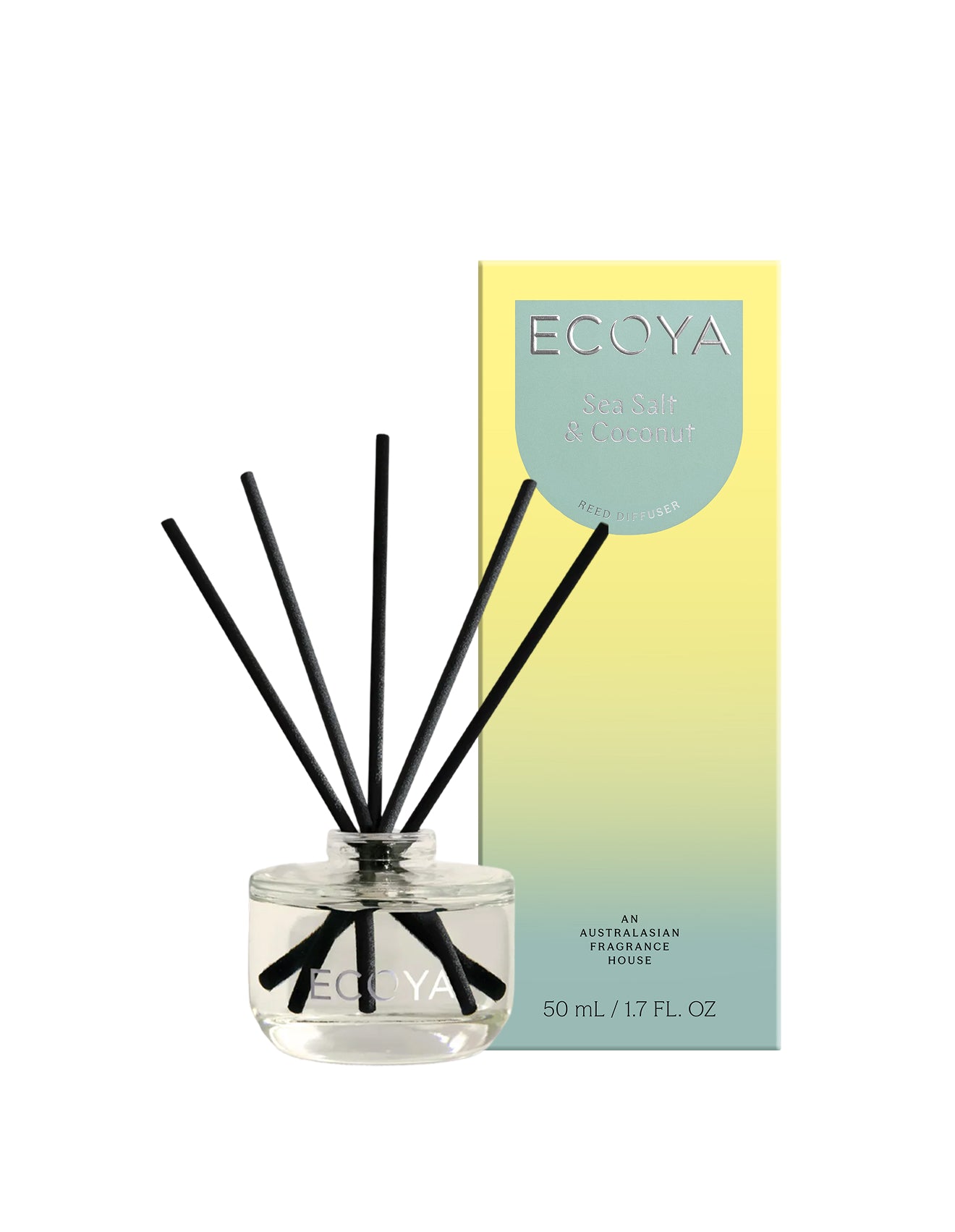 Ecoya Sea Salt and Coconut Mini Reed Diffuser in a glass vessel with black reeds.