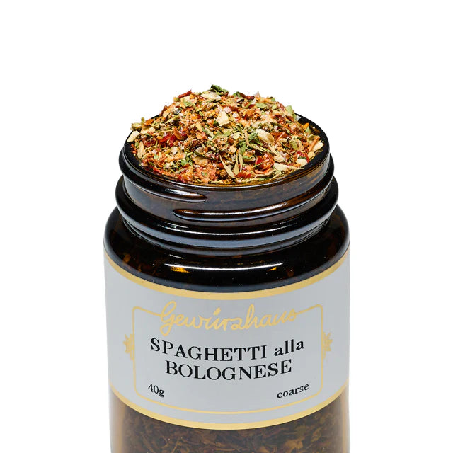 Close up of Bolognese spice blend showing herbs and dried pepper