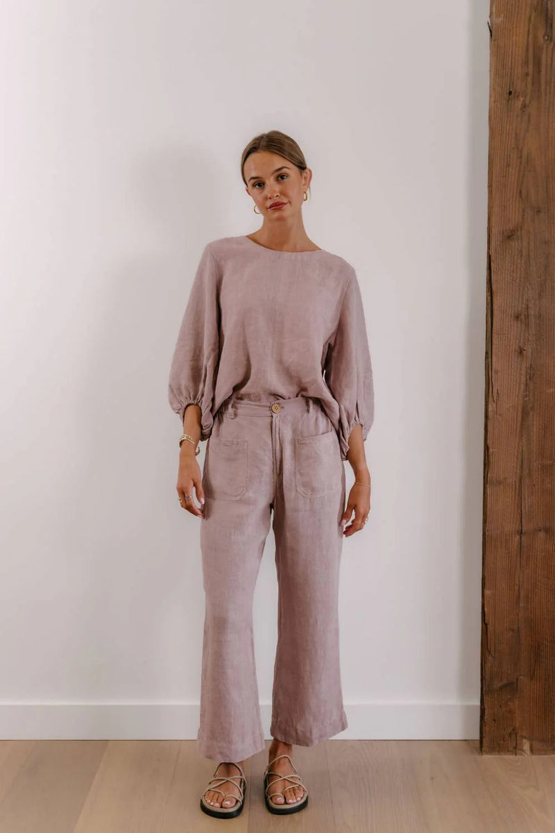 Relaxed fit 100% linen top in soft lilac with breathable fabric and gathered sleeve detailing.