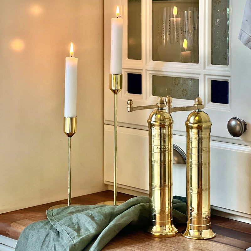Alexander brass salt mill with chiseled body and gold finish