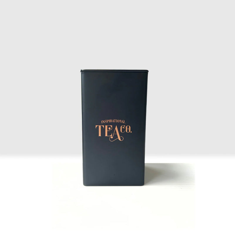 Black Tea Caddy Container infront of a white background. Features the Inspirational Tea Co. logo on the front. Tea Storage container.