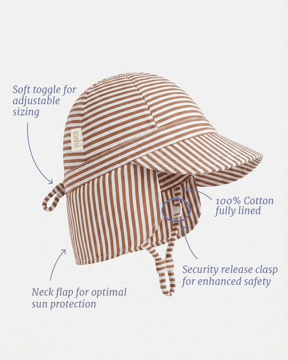 Baby cotton flap cap with protective neck flap, adjustable ties and safety-release clasp by Toshi.