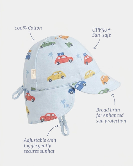 Blue Toshi baby flap cap with mini cars and UPF 50+ sun protection.