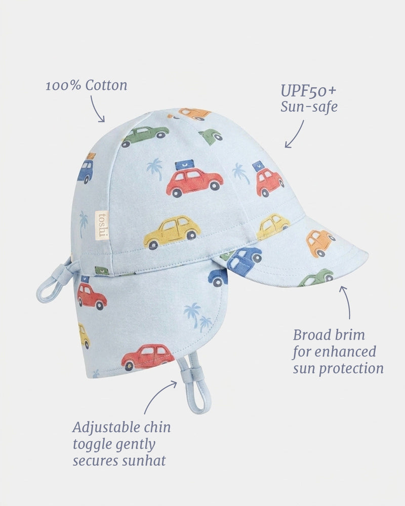 Blue Toshi baby flap cap with mini cars and UPF 50+ sun protection.