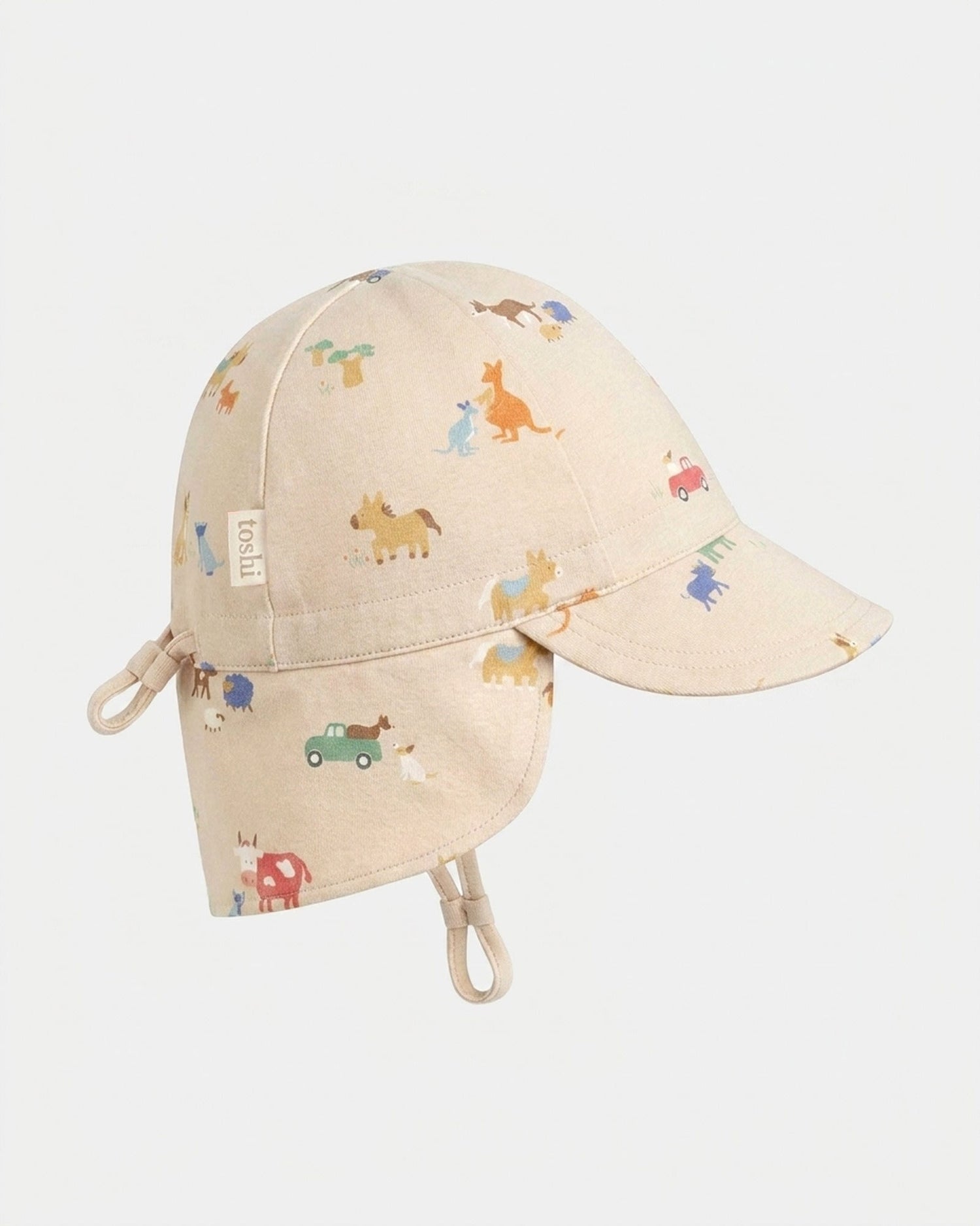 Toshi Flap Cap Arcadia Station Hands baby sun hat with country-inspired print.