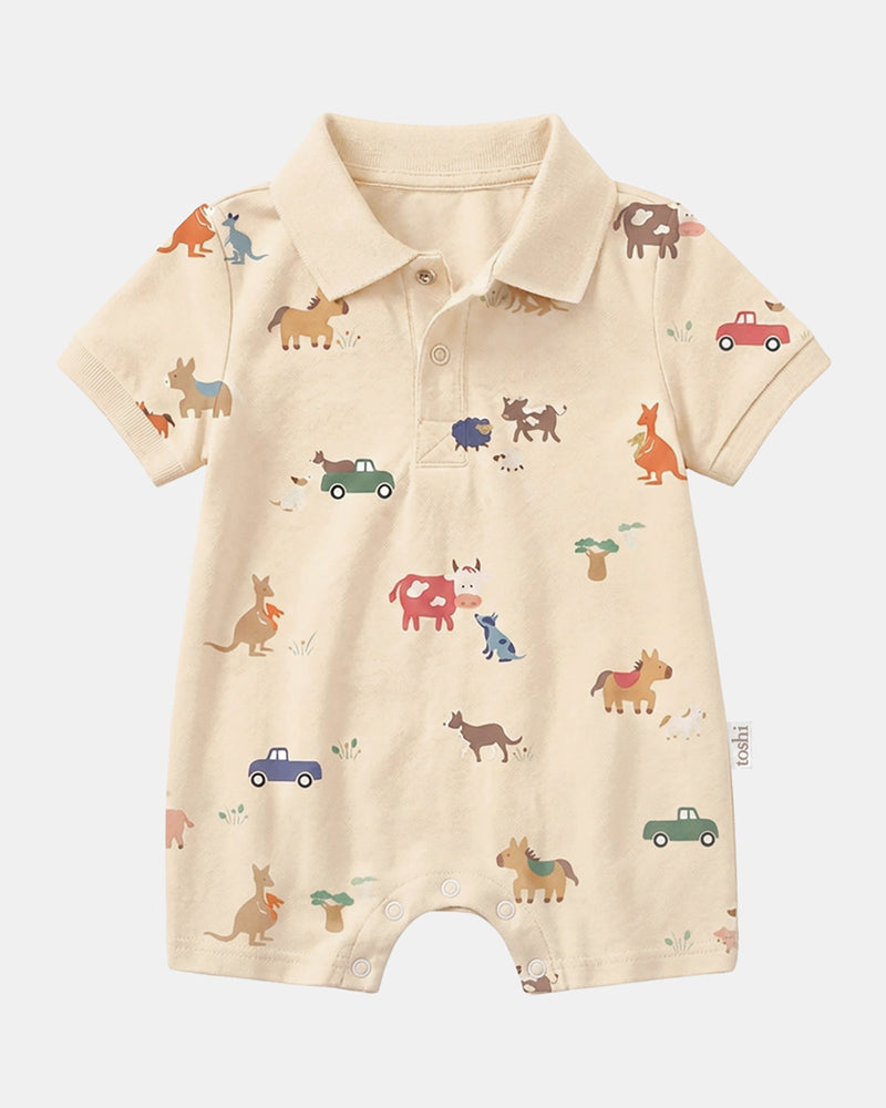 Cotton baby polo onesie in Toshi Station Hands print