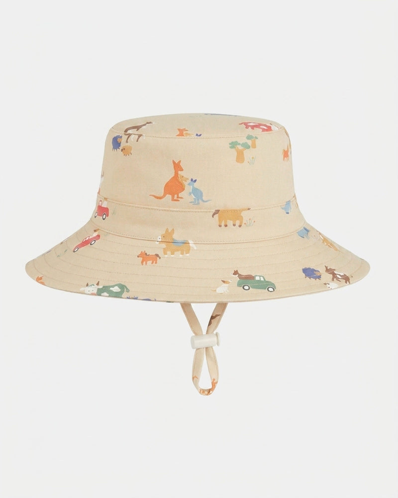 Children's cotton sun hat with adjustable toggle and safety-release chin strap by Toshi
