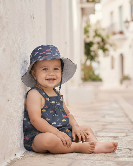 Toshi UPF 50+ cotton sun hat in Tide Big Mini for children.