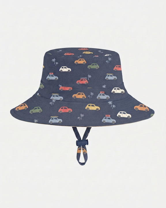 Children's navy cotton sun hat with adjustable toggle and safety-release chin strap by Toshi.