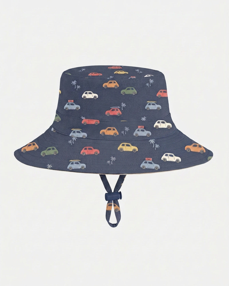 Children's navy cotton sun hat with adjustable toggle and safety-release chin strap by Toshi.