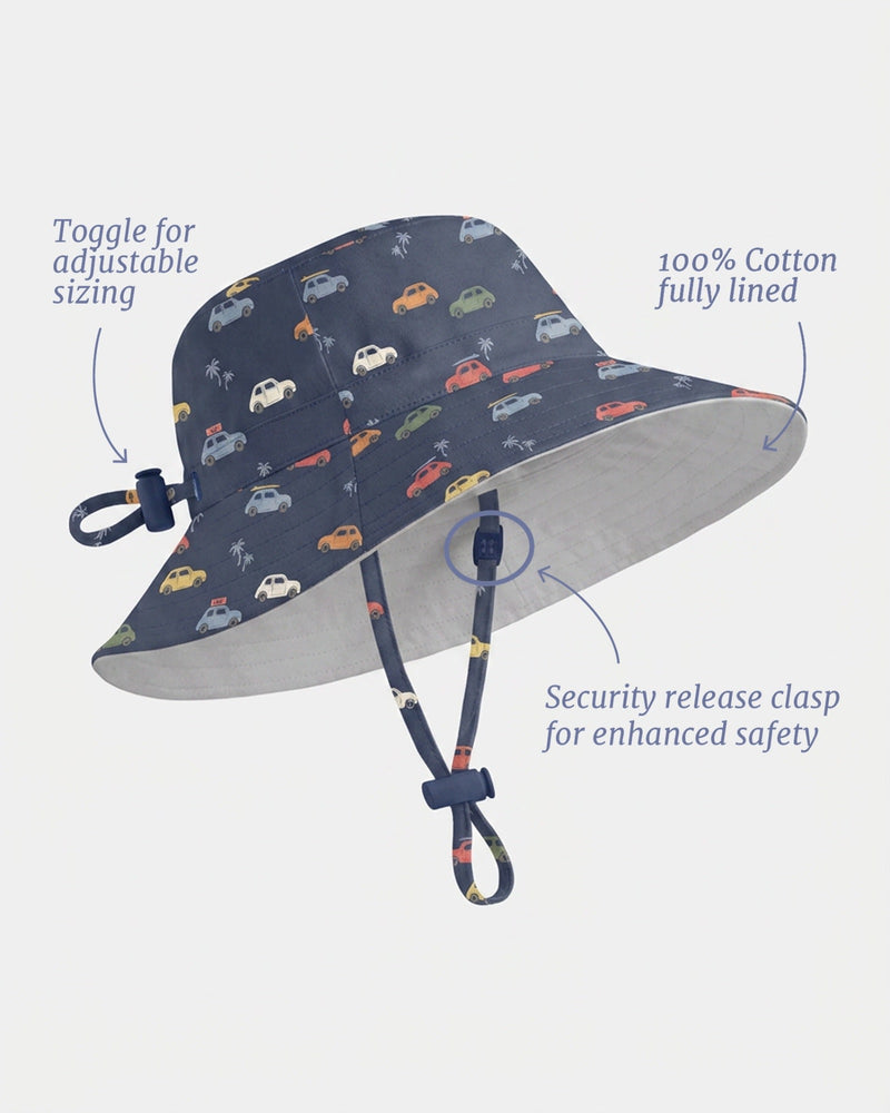 Navy blue children's hat with colourful mini car patter.