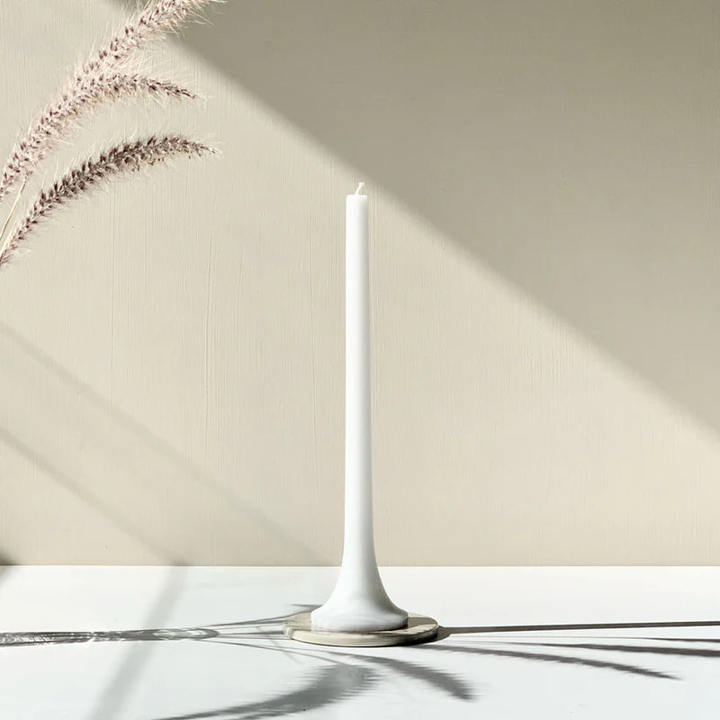 Elegant white taper candles with stable base
