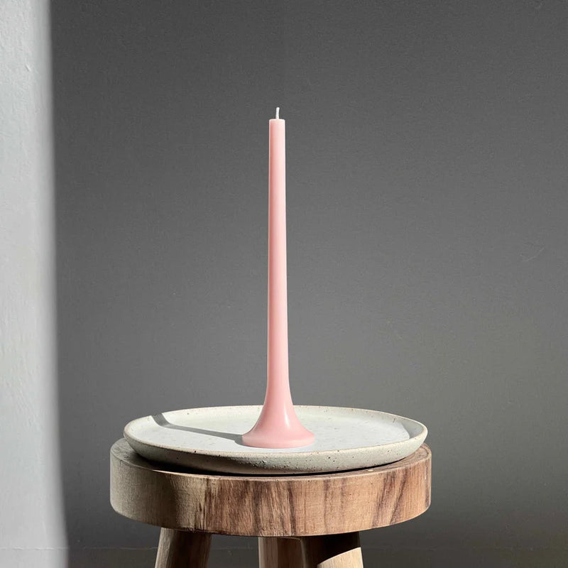 Elegant pastel pink taper candles with stable base