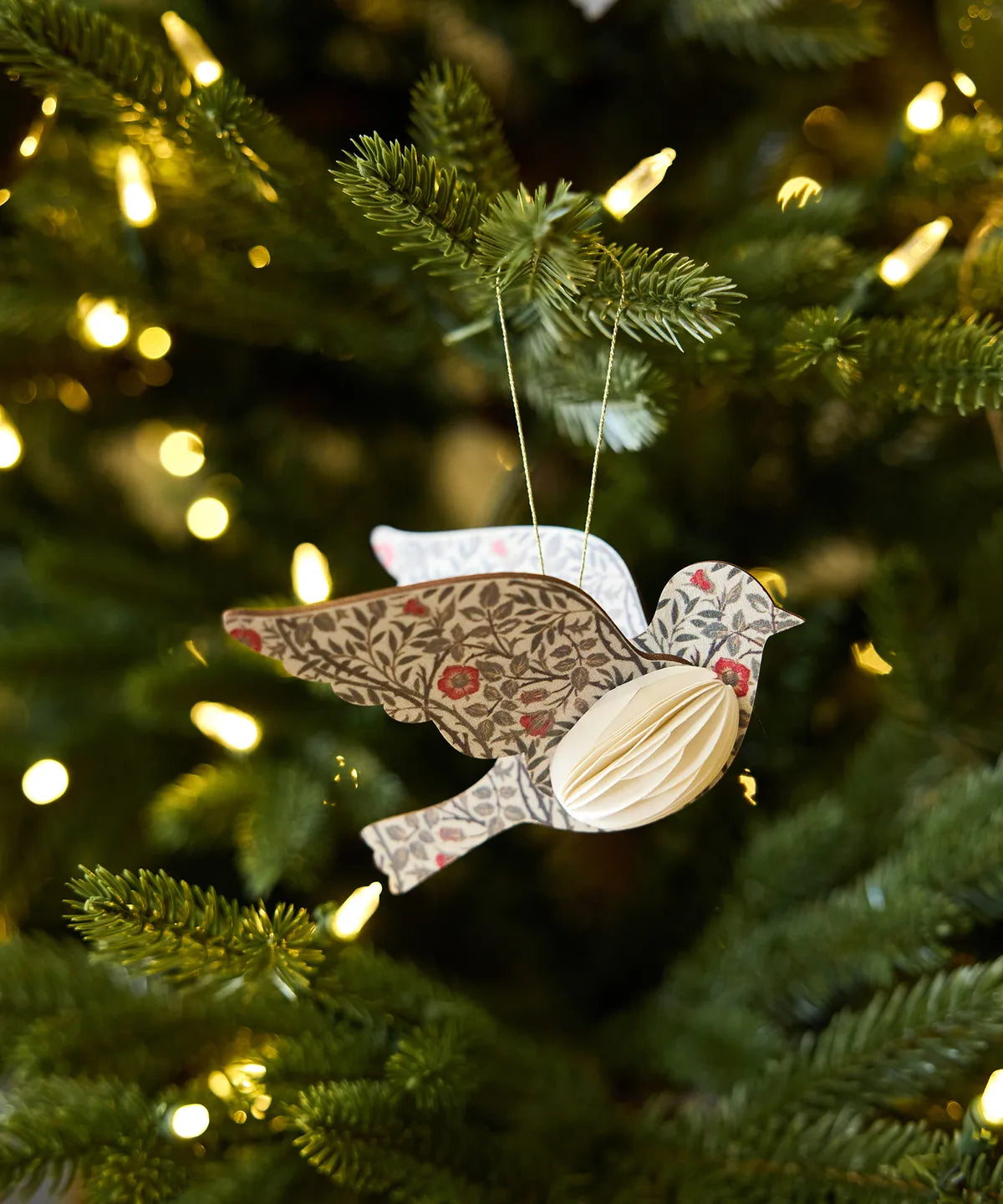 Close-up of floral patterned Christmas bird decoration