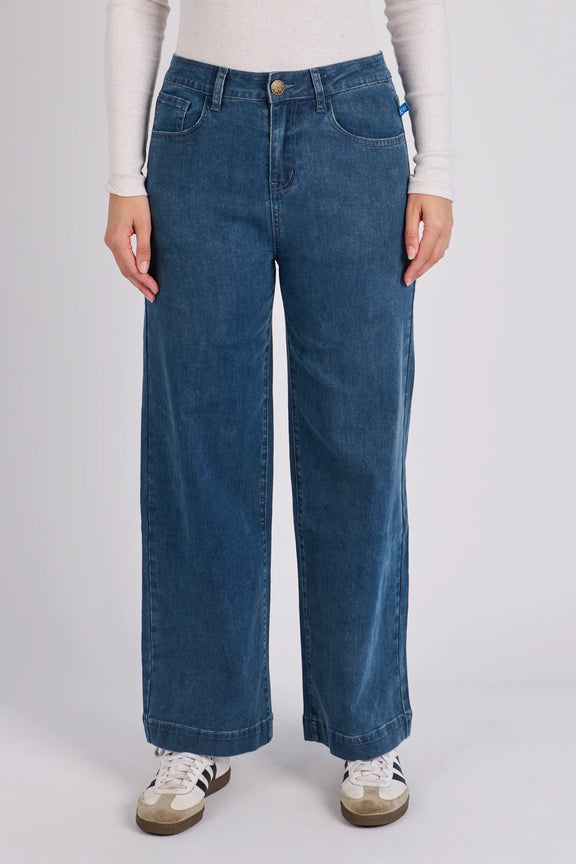 Women's mid blue wash wide leg boyfriend jeans with cropped length and classic five-pocket styling.