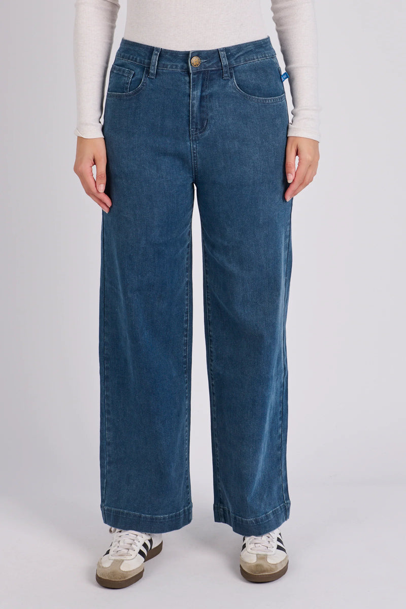 Women's mid blue wash wide leg boyfriend jeans with cropped length and classic five-pocket styling.
