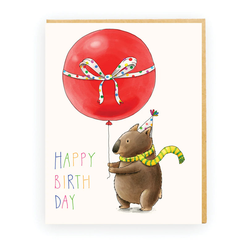 Birthday card featuring a wombat holding a birthday ballon with the text 'happy birth day'