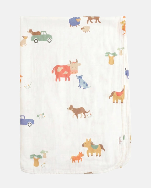 Toshi 100% cotton muslin baby wrap with colourful farm animal design.