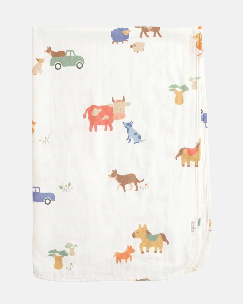 Toshi 100% cotton muslin baby wrap with colourful farm animal design.